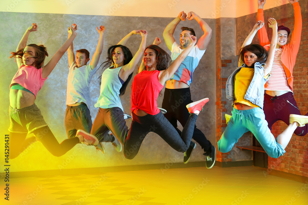 Group of young hip-hop dancers in studio