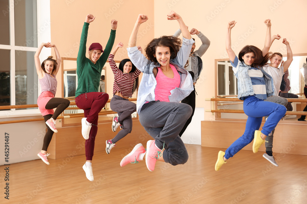 Group of young hip-hop dancers in studio Stock Photo | Adobe Stock