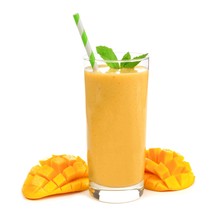 Healthy Mango Smoothie In A Glass With Mint And Straw Isolated On White