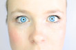 © tiagozr - Close up of beautiful blue eyes