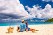 © haveseen - Couple on a beach at Seychelles