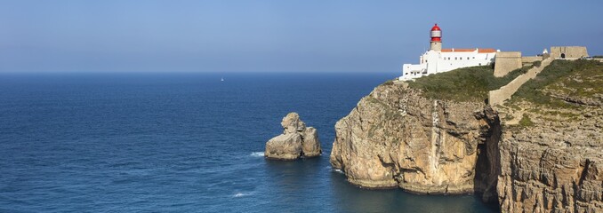 Wall Mural - panoramic view to ocean and lighthouse on the rock