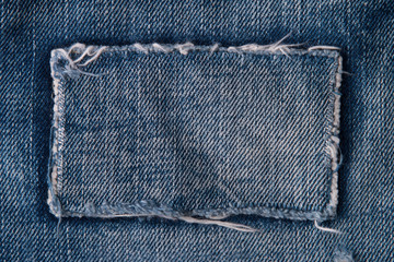 patch on blue jeans