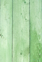 Natural weathered wooden planks background. Old painted in green boards panels