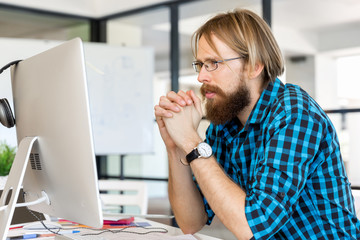 Young man working in office