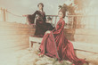 © DC Studio - Two sexy ladies in vintage clothes on a boat. Luxury and glamour