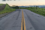 Fototapeta Kuchnia - Sunset over a country road winery California