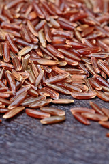 Wall Mural - Group of red rice on table