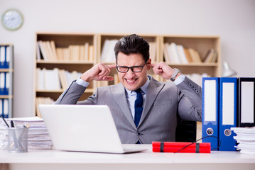 Wall Mural - Businessman with dynamite in the office