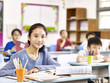 © imtmphoto - asian elementary schoolgirl in class at school.