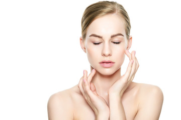 Wall Mural - beautiful young blond woman with perfect skin touching her face. facial treatment. cosmetology, beau