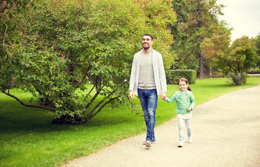 Wall Mural - happy family walking in summer park