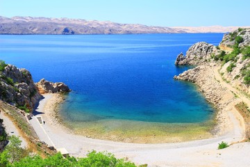 Sandy beach and blue sea in Karlobag, Croatia