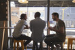 © Monkey Business - Rear View Of Three Male Friends Meeting In Coffee Shop