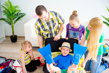 Wall Mural - Family packing suitcases