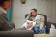 © pressmaster - Mature woman making notes while listening to worried patient