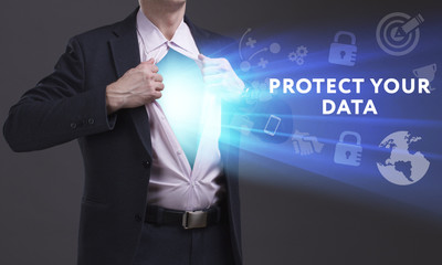 Business, Technology, Internet and network concept. Young businessman shows the word: Protect your data