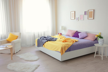 Sticker - Interior of light bedroom with lilac bedding