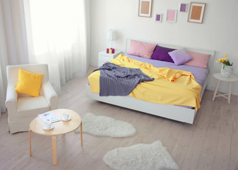 Sticker - Interior of light bedroom with lilac bedding