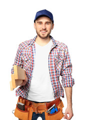 Wall Mural - Handsome young carpenter on white background