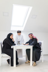 Wall Mural - Happy Arabic family at dining room