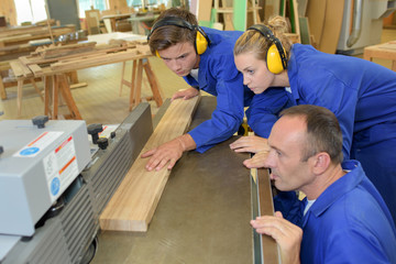 Poster - Apprentice carpenter using machinery