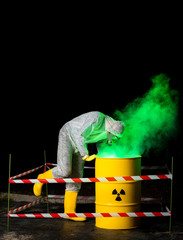 Sticker - biohazard worker and radioactive green smoke coming out from yellow barrel