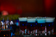 © Volodymyr - cocktail colorful background in night club on bar table top