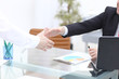 © PhotoStar - Close up view of business partnership handshake concept.Photo of two businessman handshaking process.Successful deal after great meeting.Horizontal,flare effect, blurred background