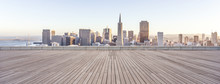 Empty Wooden Floor With Cityscape Of Modern City