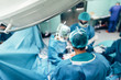 © santypan - Team of Surgeons Operating.