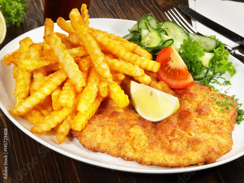 Schnitzel Mit Pommes Frites Und Salat Buy This Stock Photo And Explore Similar Images At Adobe Stock Adobe Stock