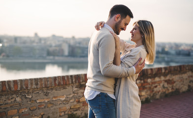 Wall Mural - Romantic couple dating in sunset