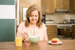 © AntonioDiaz - Senior adult woman forced to eat