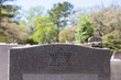 Headstone in Jewish Cemetery with Star of David and Memory Stones
