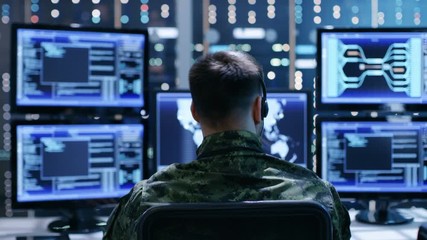 Aufkleber -  Back View of Military Technical Support Professional Giving Instructions Using Headset. He's  Works in Monitoring Room. Shot on RED EPIC-W 8K Helium Cinema Camera.