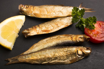 Wall Mural - smoked sprats with tomato and lemon