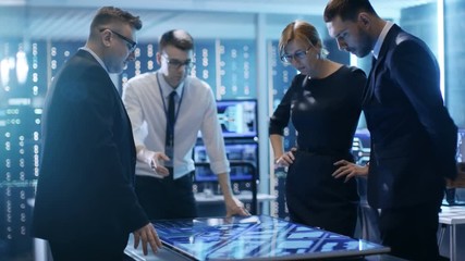 Aufkleber - Team of Government Investigators Tracing Criminal with Help of Touchscreen Interactive Table in Big Monitoring Room Full of Computers with Animated Screens. Shot on RED EPIC-W 8K Helium Cinema Camera.