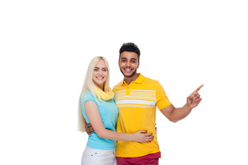 Sticker - Beautiful Young Happy Couple Love Smiling Embracing, Hispanic Man Woman Point Finger To Empty Copy Space Isolated Over White Background