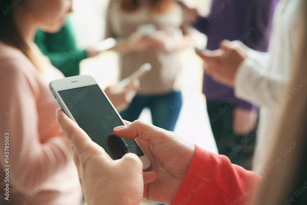 Male hands with smartphone, closeup