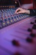 © Wavebreak Media - Hands of female audio engineer using sound mixer