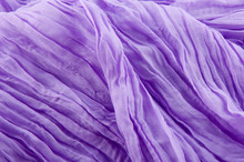 Background Made Of Purple Rippled Scarf