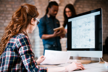 Company employees working in office
