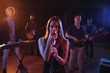 © Wavebreak Media - Band performing in studio