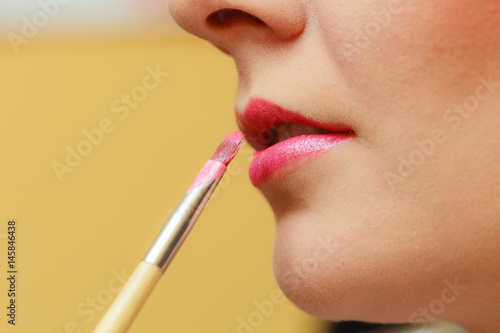 Close up woman getting make up, lips Tableau sur Toile
