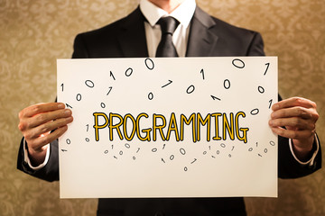Programming text with businessman