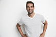 © sanneberg - Confident guy in studio in striped t-shirt, portrait