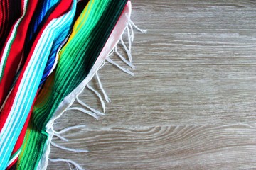 Mexican poncho Mexico background cinco de mayo blanket fiesta background with stripes copy space pattern rug stock photo photograph image picture 