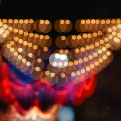 Defocused bokeh lights in blur night background