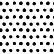 Abstract black and white retro seamless background. Hand drawn black ink polka dot pattern. Vector illustration.